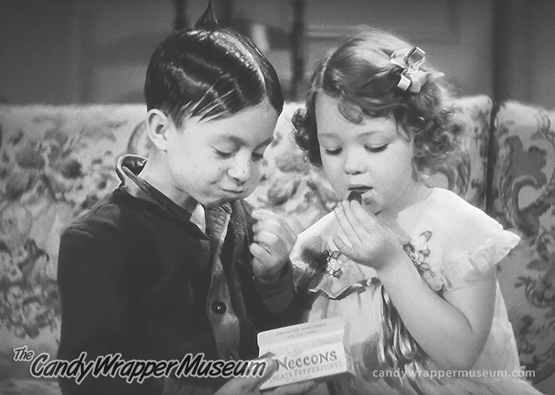 Alfalfa and Marianne eating Necco Chocolate Peppermints in the Our Gang comedy short 